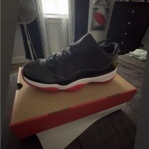 Jordan Retro 11 Black and Red Sneakers